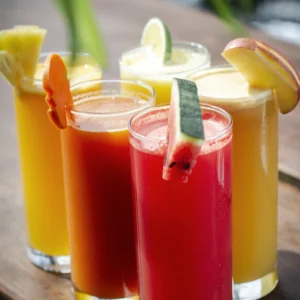 mixed fresh organic fruit juices glasses on sunny 2026 03 25 09 26 23 utc